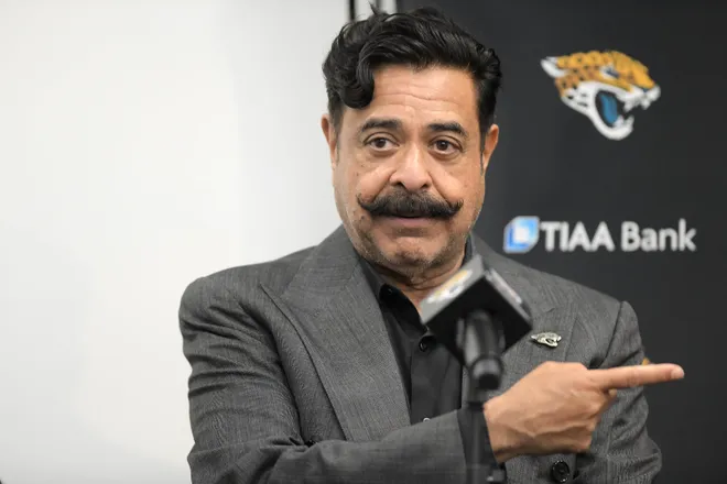 Shahid Khan speaking at a press conference